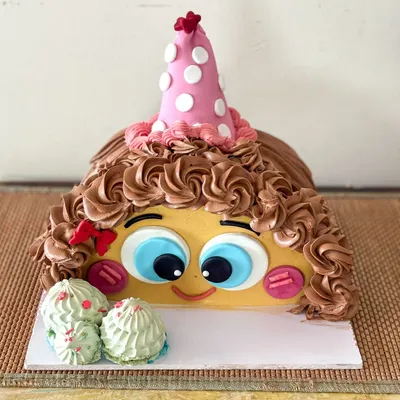 Celebrating a half-birthday! This is a 1/2 cake I made for Kiara's "one and a half" birthday. It's a super fun and unique way to mark those mini-milestones.