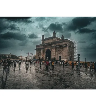 A moody, dramatic shot of the Gateway of India in Mumbai on a rainy, overcast day. This shows my ability to find beauty even in gloomy weather, no matter the location.