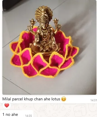 This photo, sent by a happy customer, fills my heart with gratitude. Seeing my crochet lotus aasan become a seat for her beautiful Lakshmi idol is the greatest reward. Her message, "Milal parcel khup chan ahe lotus" (Received the parcel, the lotus is very beautiful), made my day.