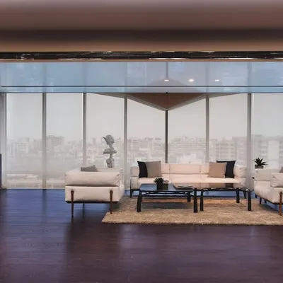 This 2000 sq. ft. DLH office is an oasis in the sky. Massive glazing on two sides invites the city skyline in, while four distinct zones for work, meetings, and relaxation ensure seamless functionality and style within a minimalist framework.