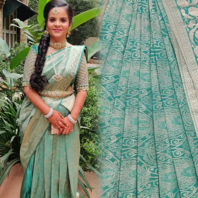 A happy bride is the most beautiful bride. For this look, we focused on clean, defined pleats to complement her intricate hairstyle and jewelry, creating a timeless and elegant bridal style.