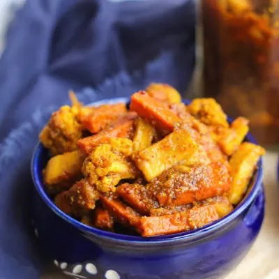 A bowl of my fresh Khatta Meetha Gobi Gajar Shalgam pickle. I offer this winter favourite in two versions, one made with sugar and another with jaggery for a more traditional taste.