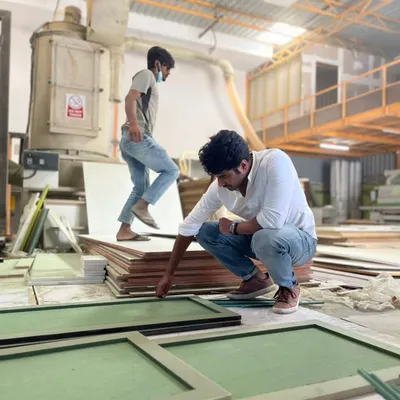 Before it becomes a piece of furniture, it's just sawdust and skill. Here's a look inside our workshop, where our architects and carpenters collaborate to ensure every panel is perfect.
