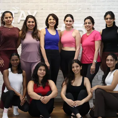 Our dream team! This photo captures the joy and camaraderie of our all-female team of instructors and members.