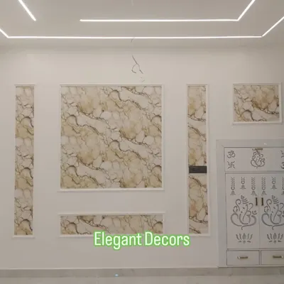 A great example of how my UV marble sheets can be used to create an elegant TV wall unit. The sheets are framed with simple white mouldings for a clean, sophisticated look, perfectly complementing the custom mandir unit.