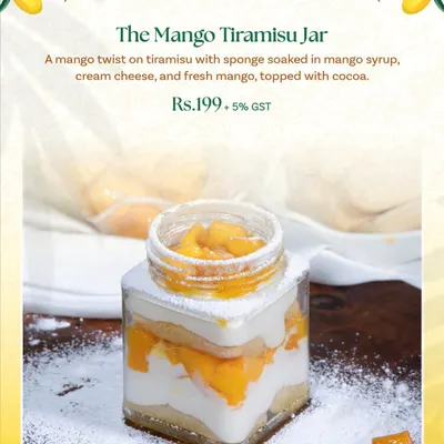 My Mango Tiramisu Jar is a seasonal favourite. It's a tropical twist on the Italian classic, with sponge soaked in mango syrup, layered with cream cheese and fresh mango, and topped with cocoa.