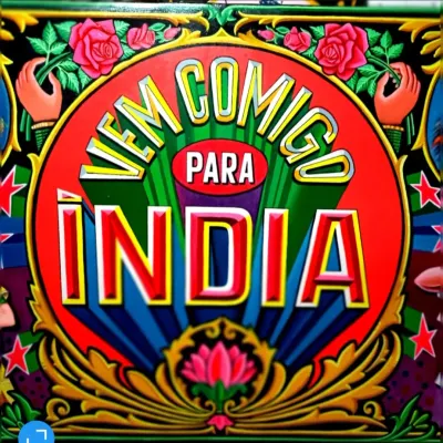 A close-up of the central lettering for the "Vem Comigo Para India" sign. Notice the 3D effect on the letters and the use of bright, contrasting colors like red, green, and yellow to grab attention.