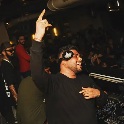 The energy is a two-way street. When the crowd gives it, I give it right back. This is me in my element, feeling the vibe of the room.