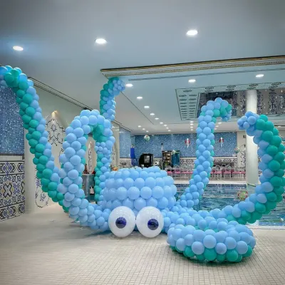 Our giant balloon octopus is always a showstopper! This incredible sculpture was the centerpiece of a poolside mermaid party, adding a huge element of fun and wonder.