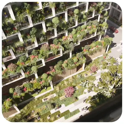 The Sky Gardens project in Hyderabad redefines high-rise living by giving each apartment a deep, private garden. This aerial detail shows the density of the green facades, which act as a natural cooling system and provide residents with a direct connection to nature.