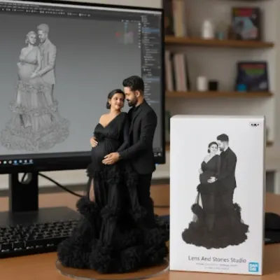 The complete journey from a digital design to a physical product. This maternity miniature in a stunning black gown shows the final statuette next to its 3D model on screen and its custom-designed box.