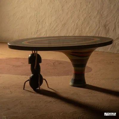 The Weavers Ant Table, where the ant is the architect. This terrazzo dining table balances the sculptural beauty of mountains with the creative force of nature, featuring harmonious colors and a unique form that make it a true statement piece.
