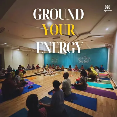 "Ground Your Energy." This image captures the essence of my sound healing workshops, where a group gathers to find stillness and balance through the power of sound vibrations.