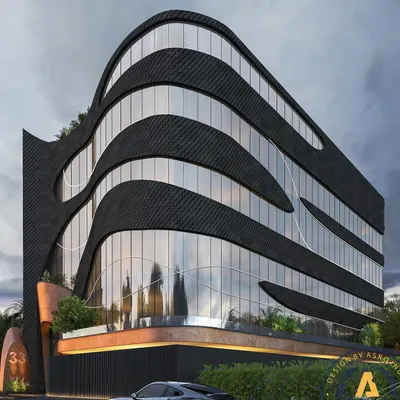 A masterpiece of fluid architecture, this multipurpose commercial building on Link Road, Delhi, stands on an 800 sq-yd plot. The facade blends sleek aluminum shingles with glass, embodying modern architectural innovation and sustainability.