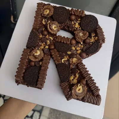 My Monogram Brownie Cake is a new addition to the menu. This 'R' is made from my fudgy Belgian chocolate brownie and loaded with Oreos, Ferrero Rocher, and hazelnuts.