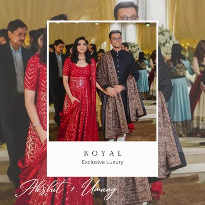 A royal moment for our clients Akshit and Umang. The groom is pictured with his bride, wearing a classic black Bandhgala paired with an exquisitely detailed shawl, a look of exclusive luxury crafted to perfection by us.