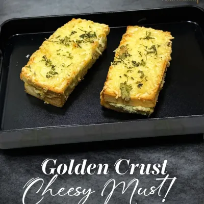 A cheesy must with a golden crust. This is my version of the perfect cheesy toast, topped with herbs and baked until bubbly. It’s the ultimate comfort food snack.