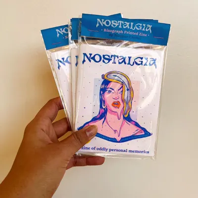 My three-color Risograph printed zine, 'Nostalgia.' I love the vibrant, slightly misaligned aesthetic of Riso printing, which perfectly suited this project about personal memories.