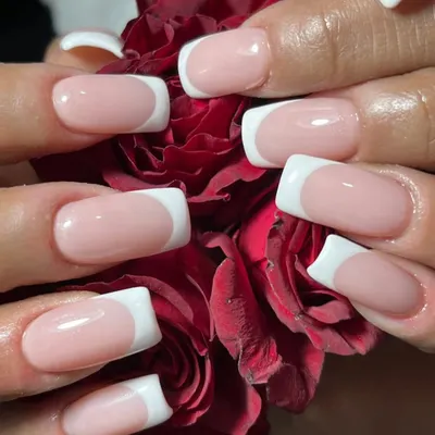 The French manicure is always a classic choice. Here, I've created a flawless set on square-shaped nail extensions, offering a look that is classy, subtle, and effortlessly chic.