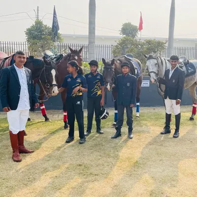 Our instructors and students stand proudly with their horses. We foster a team environment where everyone supports each other's growth.