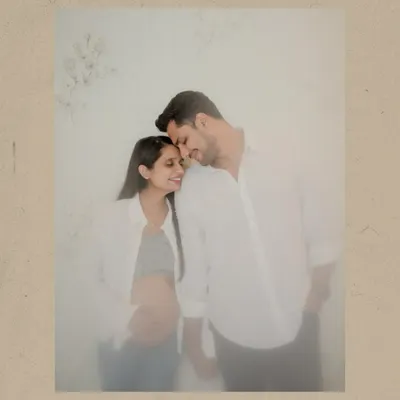 An intimate portrait of the expecting couple. The "half me, half you" sentiment perfectly describes this special time, which I aim to capture in a simple and heartfelt way.