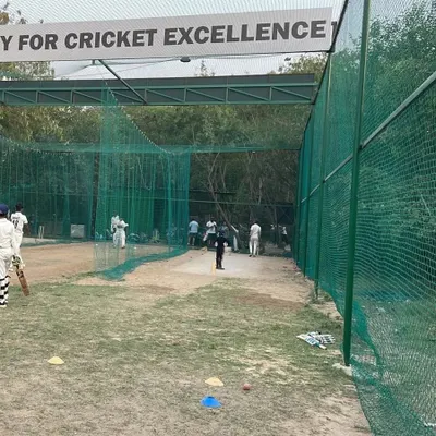 A wide view of our spacious, 17-foot high caged cricket nets at the Ramjas Sports Complex. This modern facility allows multiple players to train simultaneously in a safe and professional environment.