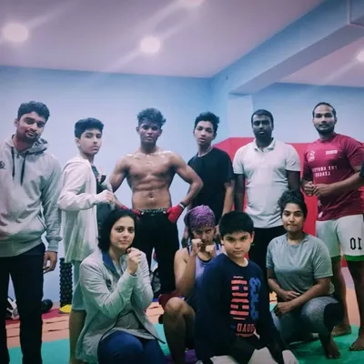 Look at the focus and determination. This is our tribe, a group of everyday people who come here to bring out the fighter within. We train hard and support each other every step of the way.