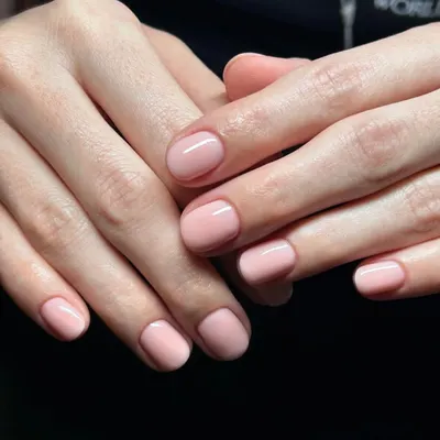 The beauty of simplicity. A flawless Russian manicure with a perfect nude-pink polish. This is the ultimate "your nails but better" look, focusing on clean cuticles and a perfect shape.
