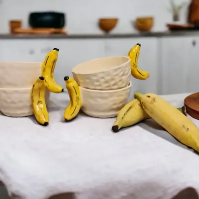 Add a touch of whimsy to your kitchen with my banana-inspired bowls. Handcrafted with love, these bowls are a playful twist on traditional ceramicware, perfect for snacks or cereal.