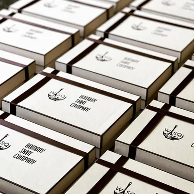A look at our collaboration with Bombay Shirt Company. We created these custom-branded dessert boxes featuring their logo, filled with our gooey flourless chocolate bars. This is a great example of how we align our premium desserts with your brand's identity for corporate events.