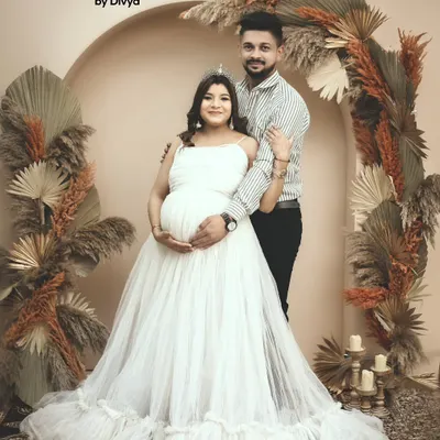 A queen awaiting her little prince or princess. This maternity session in my studio uses a beautiful boho theme with dried pampas grass to create a warm, earthy, and royal portrait for the mom to be.
