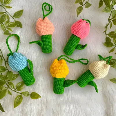 A collection of my tulip lipstick holders in various colors. These cute charms keep your lipstick handy and add a floral touch to your bag.