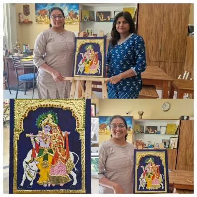 Hamsa proudly displays her completed Tanjore painting of Radha and Krishna. She has masterfully executed the intricate gold work and detailing that this art form is famous for.