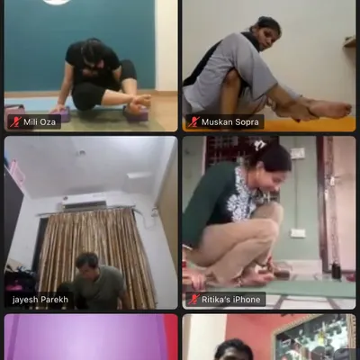 A screenshot from our online yoga class, showing students practicing various asanas from their homes. We ensure everyone receives attention, even through a screen.