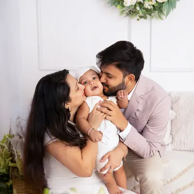 Three hearts beating as one. This is the kind of pure, loving moment I strive to capture in every family session. It's a memory to be treasured forever.