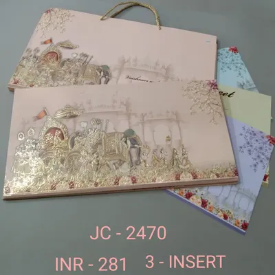 This invitation unfolds to reveal a magnificent baraat procession, detailed with gold foil and vibrant colors. The set includes a matching carry bag, perfect for presenting a grand wedding announcement.