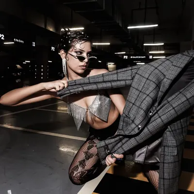 A variation of the parking garage shoot, with a slightly different crop and color grade, emphasizing the edgy, raw aesthetic.
