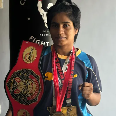 This is what victory looks like. We congratulate our fighter Rafiya on becoming the AIMMAF East Zone Champion. We don't just train fighters, we build champions who bring home the belts.