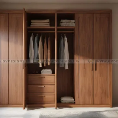 This wooden hinged wardrobe is a perfect blend of timeless elegance and functionality. The classic panelled door design and warm wood finish provide a sophisticated look, while the interior offers ample space for organized storage.