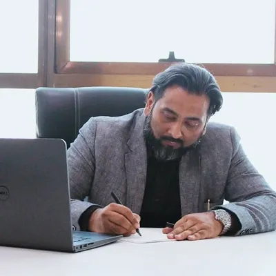 The process often begins with a simple sketch. Here, our Principal Architect visualizes the facade design for a project, allowing for quick exploration of ideas before moving to digital modeling.