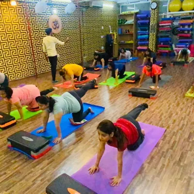 Full house for our morning aerobics class! We use steppers and bodyweight exercises to get your heart pumping and build stamina. It's high energy and lots of fun.