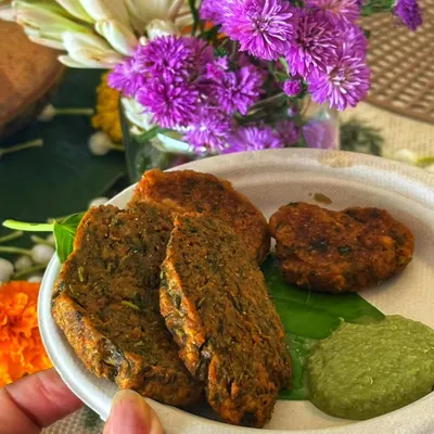 Kothimbir Wadi, a classic Maharashtrian snack that I make every day. We roll it, steam it, slice it, and then fry it to perfection. It's crispy, herby, and absolutely delicious, especially with a spicy chutney.