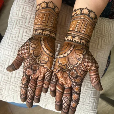 An intricate design featuring a band of elephants, symbolizing strength and good fortune, combined with classic floral and geometric patterns.