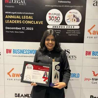 Holding my BW Legal 30 Under 30 award. It was a fantastic feeling to be included in this elite club, and this honor is a testament to the collective effort of everyone who has supported me.