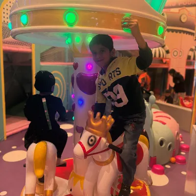 The fun begins on our gentle horse carousel. It's a classic ride that brings a smile to every child's face and is a perfect starting point for a day of play.