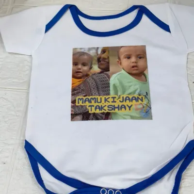 A custom-printed baby onesie featuring photos and the phrase "Mamu ki Jaan Takshay". A super cute and personal gift for a new baby in the family.