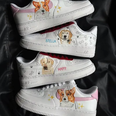 A collection of custom Nike Air Force 1s featuring adorable, hand-painted portraits of different dogs, including a Corgi and a Golden Retriever.