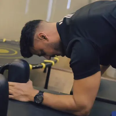 Taking a moment to focus during my own workout. I practice what I preach, constantly working on my own form and control to be the best possible guide for my clients.