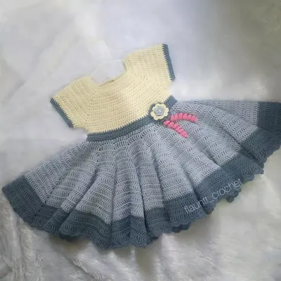 Here is another look at the Baby Princess Frock, showing the optional flower accessory at the waist. Every detail, from the color gradient on the skirt to the fit of the bodice, can be customized for your child's special day.