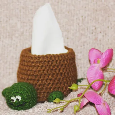 Meet my tortoise tissue holder. This quirky and adorable piece is a great conversation starter and a fun way to disguise a standard tissue box on your table or desk.